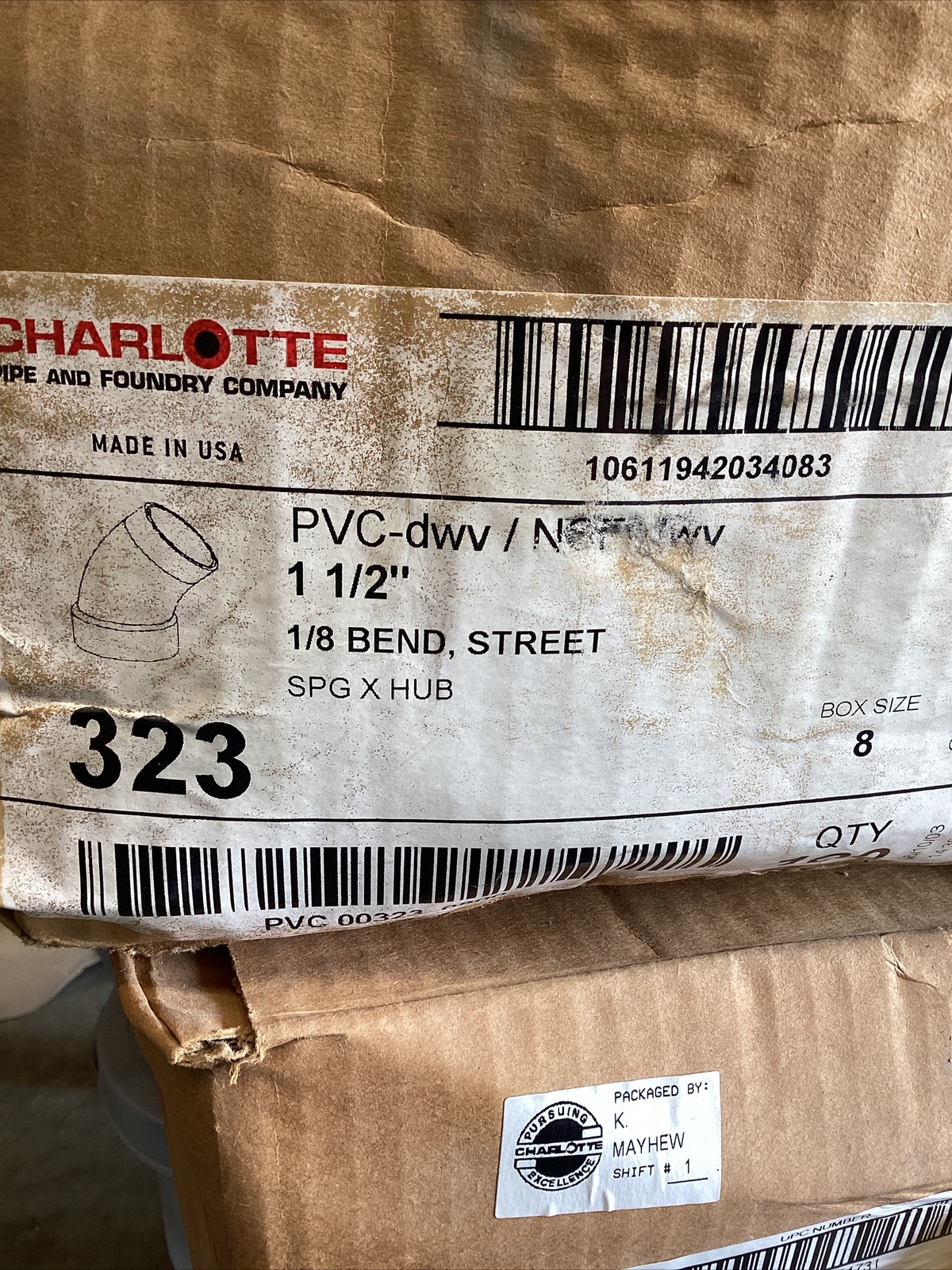 75+White 1-1/2” Charlotte #323 PVC DWV 1/8” Bent Street Elbow SPG x Hub