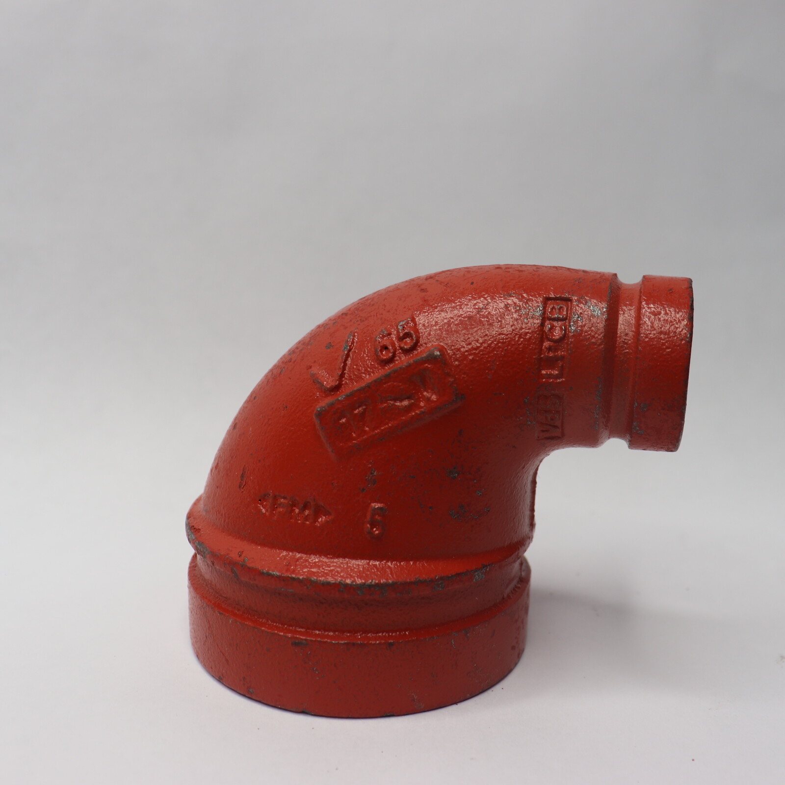 Victaulic 90 Degree Reducing Elbow Orange Enamel Ductile Iron 2-1/2″ x 1″ 65