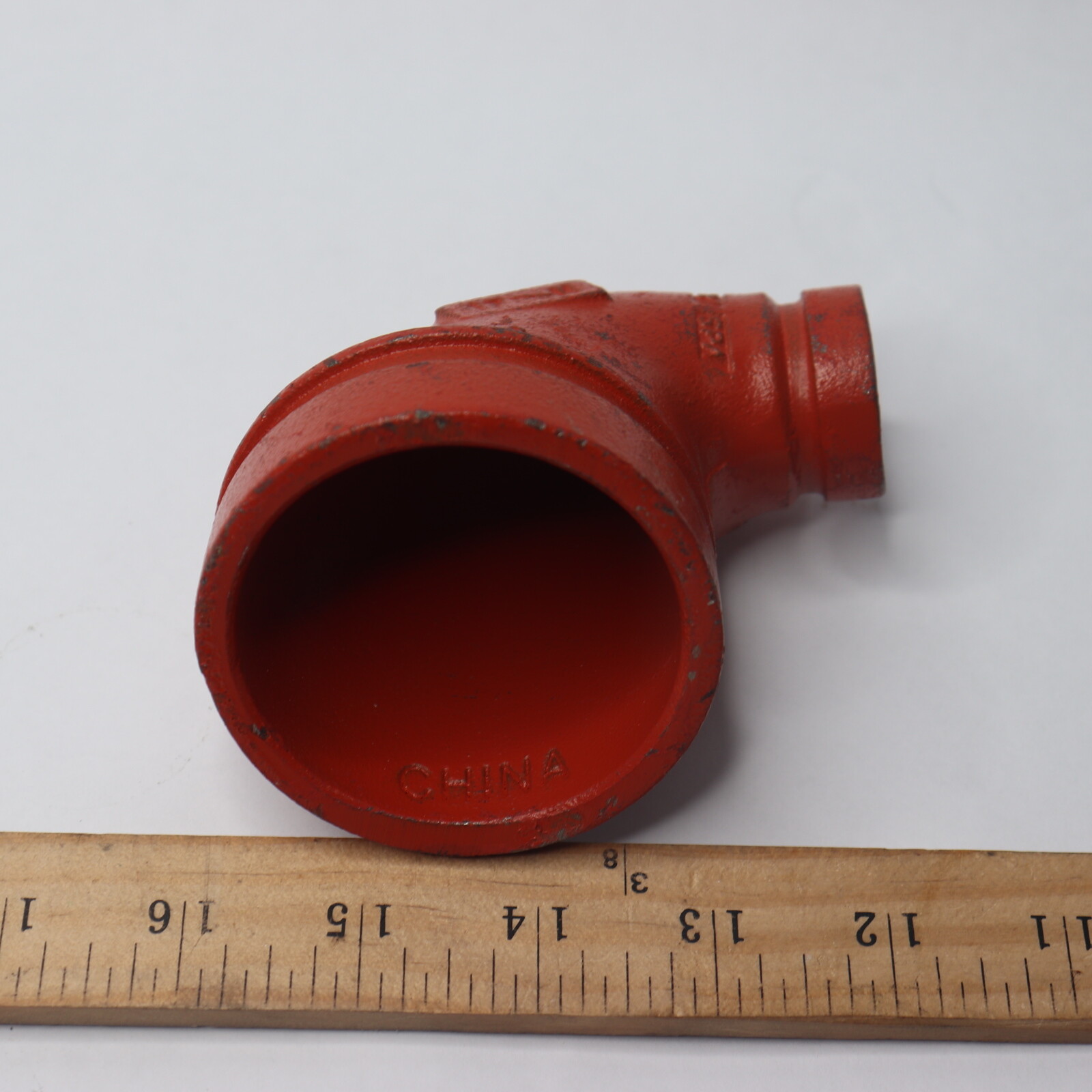Victaulic 90 Degree Reducing Elbow Orange Enamel Ductile Iron 2-1/2″ x 1″ 65
