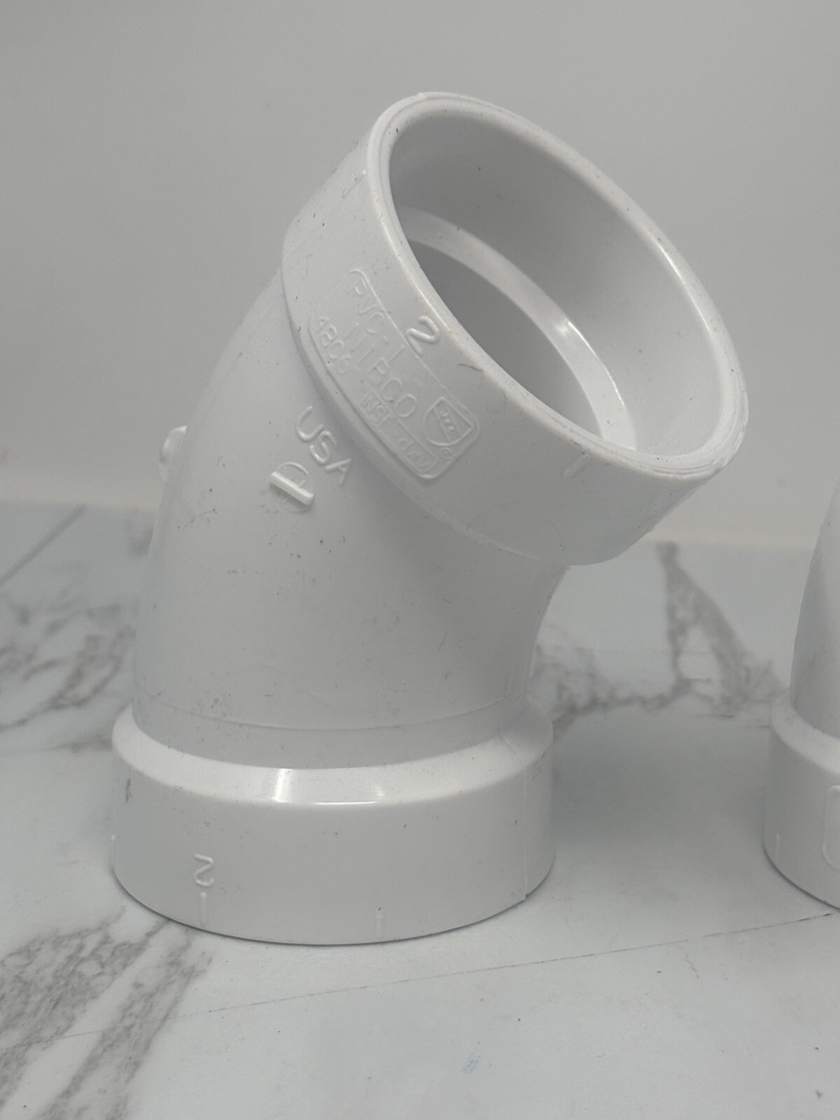 LOT OF 2 – NIBCO 2 in. PVC 45-Degree Hub x Hub Elbow Pipe Fittings C4808HD2