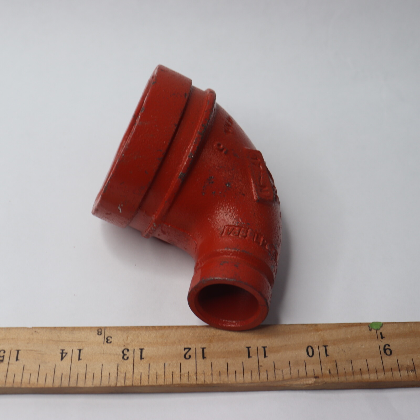 Victaulic 90 Degree Reducing Elbow Orange Enamel Ductile Iron 2-1/2″ x 1″ 65