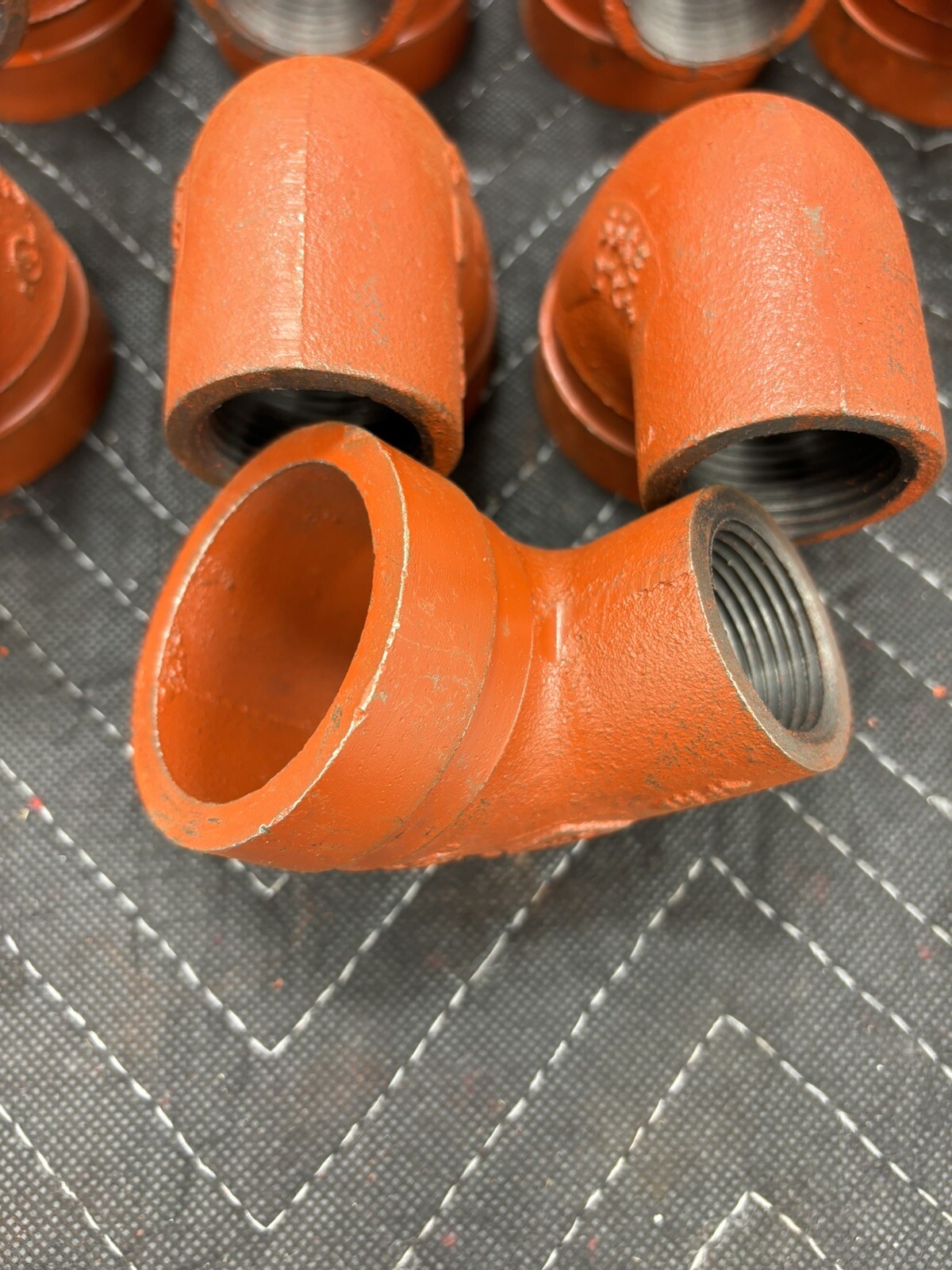 Victaulic (Like Gruvlok) 90 Degree Reducing Elbow Orange Enamel Ductile Iron