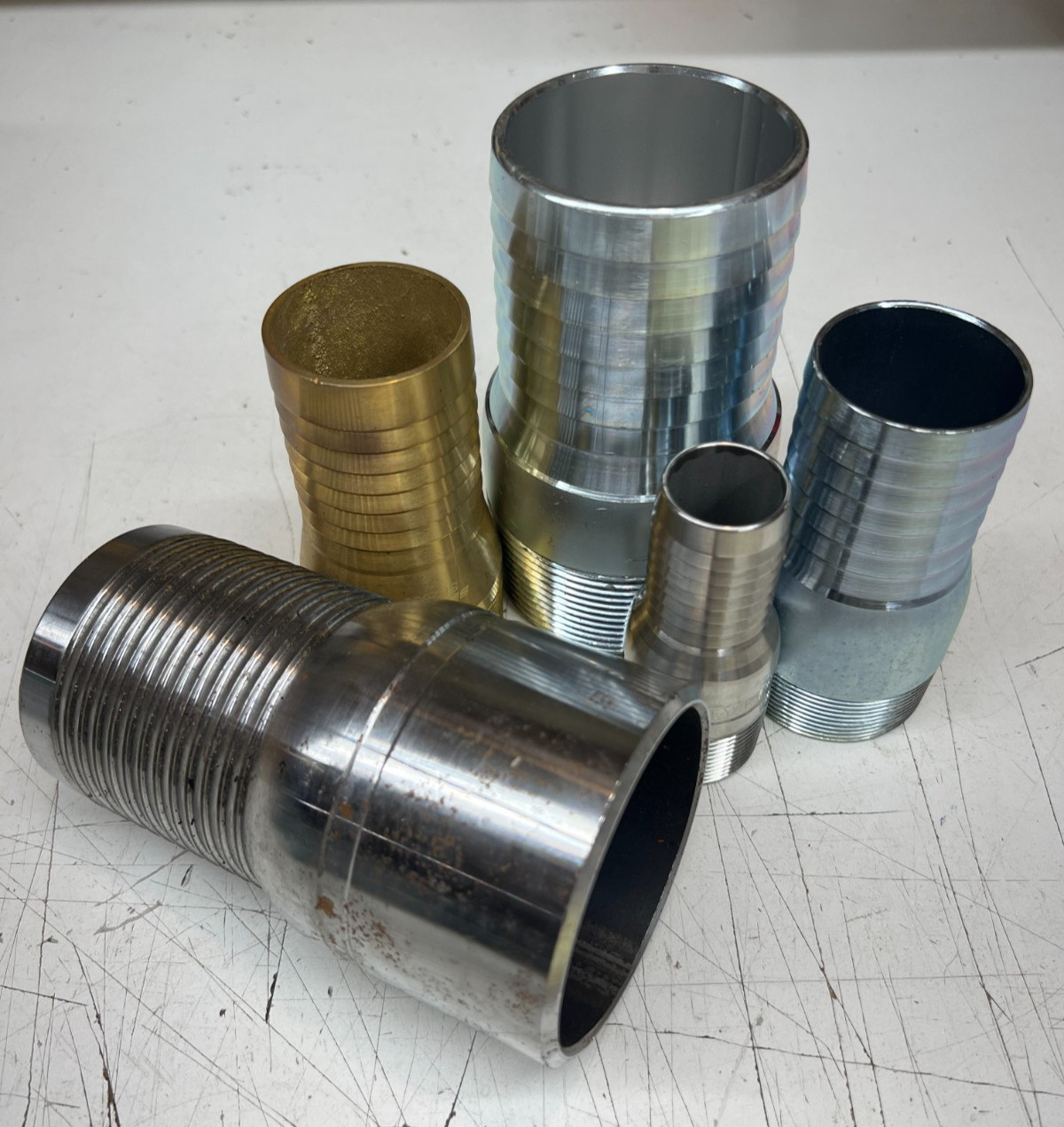 Various Size Material Connection x Hose Barb KC Shank Combination Nipple Fitting