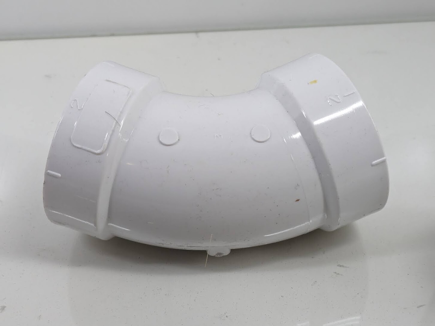 NIBCO 2 in. PVC DWV 45-Degree Hub x Hub Elbow Pipe Fitting – White C4806HD2