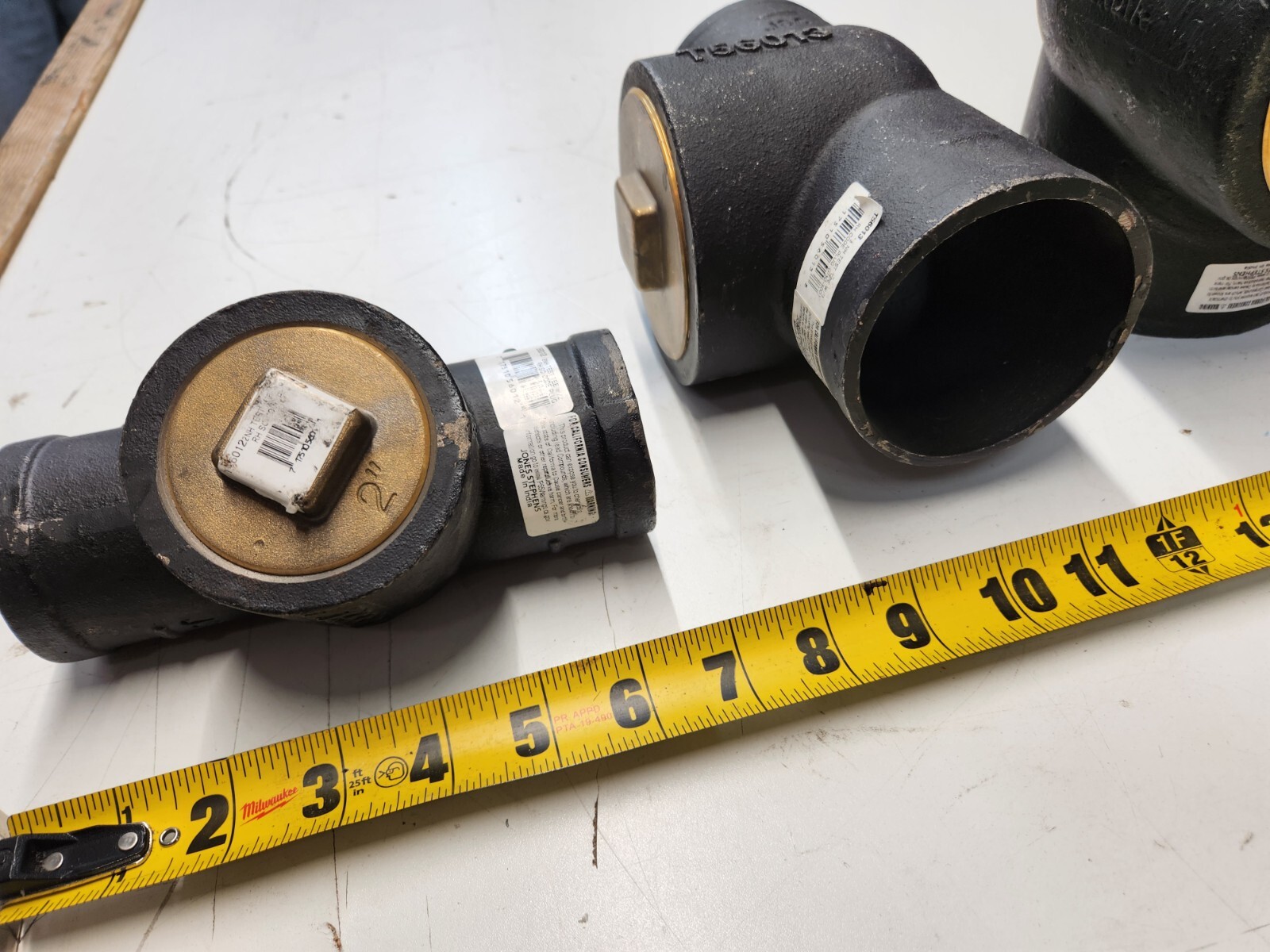 Various Sizes of Jones Stephens Test Tee T56 No-Hub Cast Iron Raised Head Brass