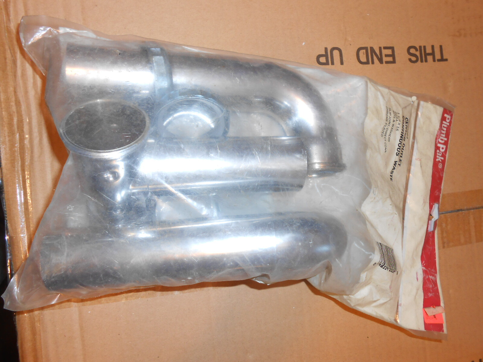 PlumbPak PP20224 Center Outlet continuous waste Chrome plated.