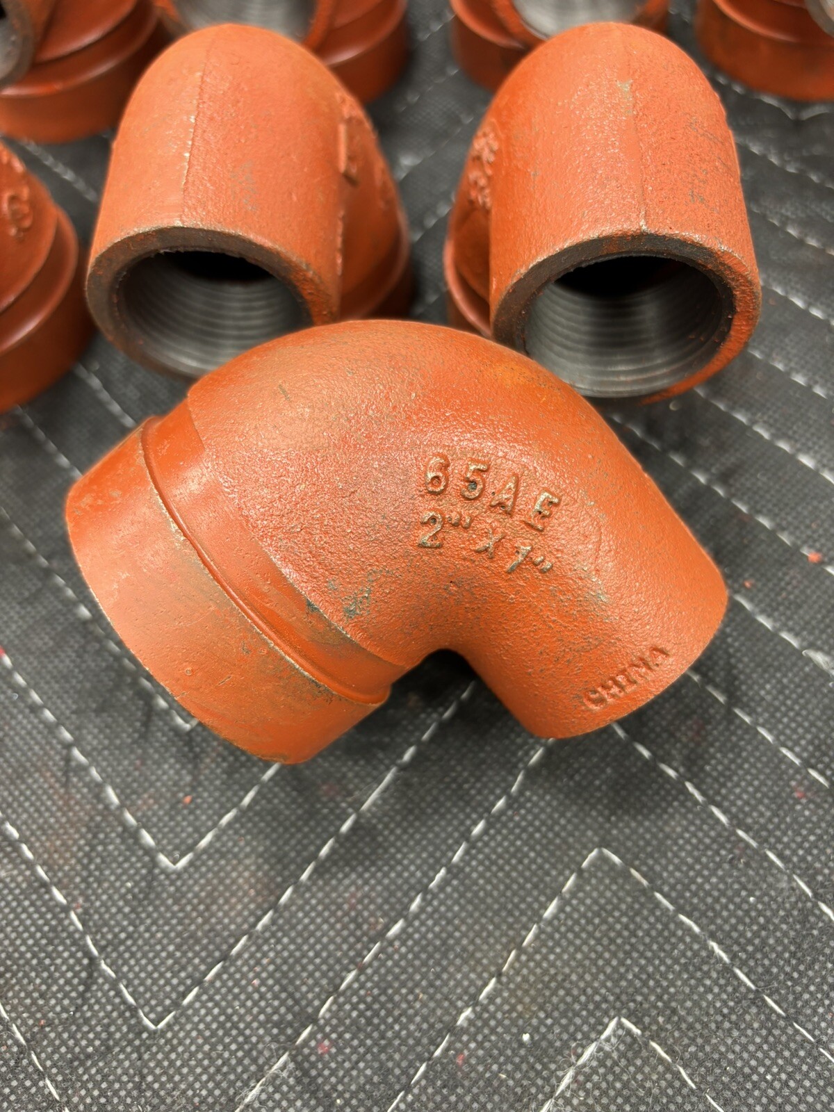 Victaulic (Like Gruvlok) 90 Degree Reducing Elbow Orange Enamel Ductile Iron
