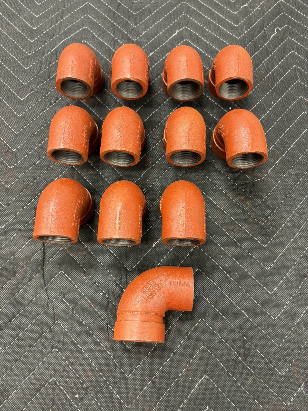 Victaulic (Like Gruvlok) 90 Degree Reducing Elbow Orange Enamel Ductile Iron