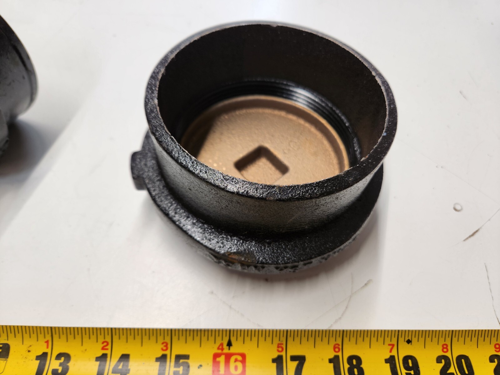 Various Sizes of Charlotte NH52 Tapped Ferrule No-Hub Cast Iron Raise Head Brass
